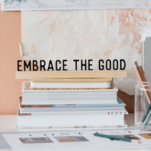 Load image into Gallery viewer, acrylic quote sign with wooden stand that says &quot;embrace the good&quot;